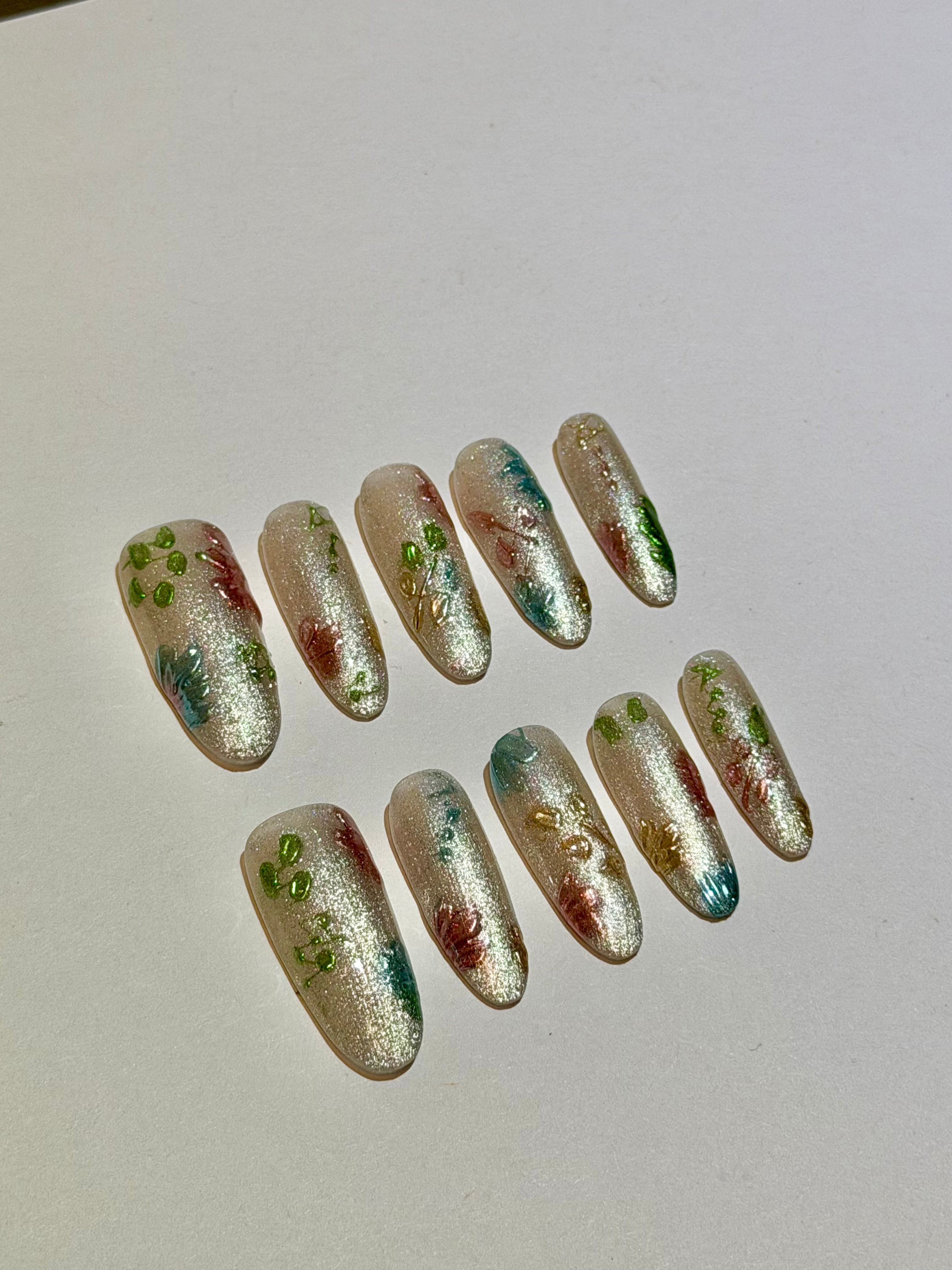 Celestial Glow – Shimmering Silver Press-On Nails with Iridescent Jewel Tones