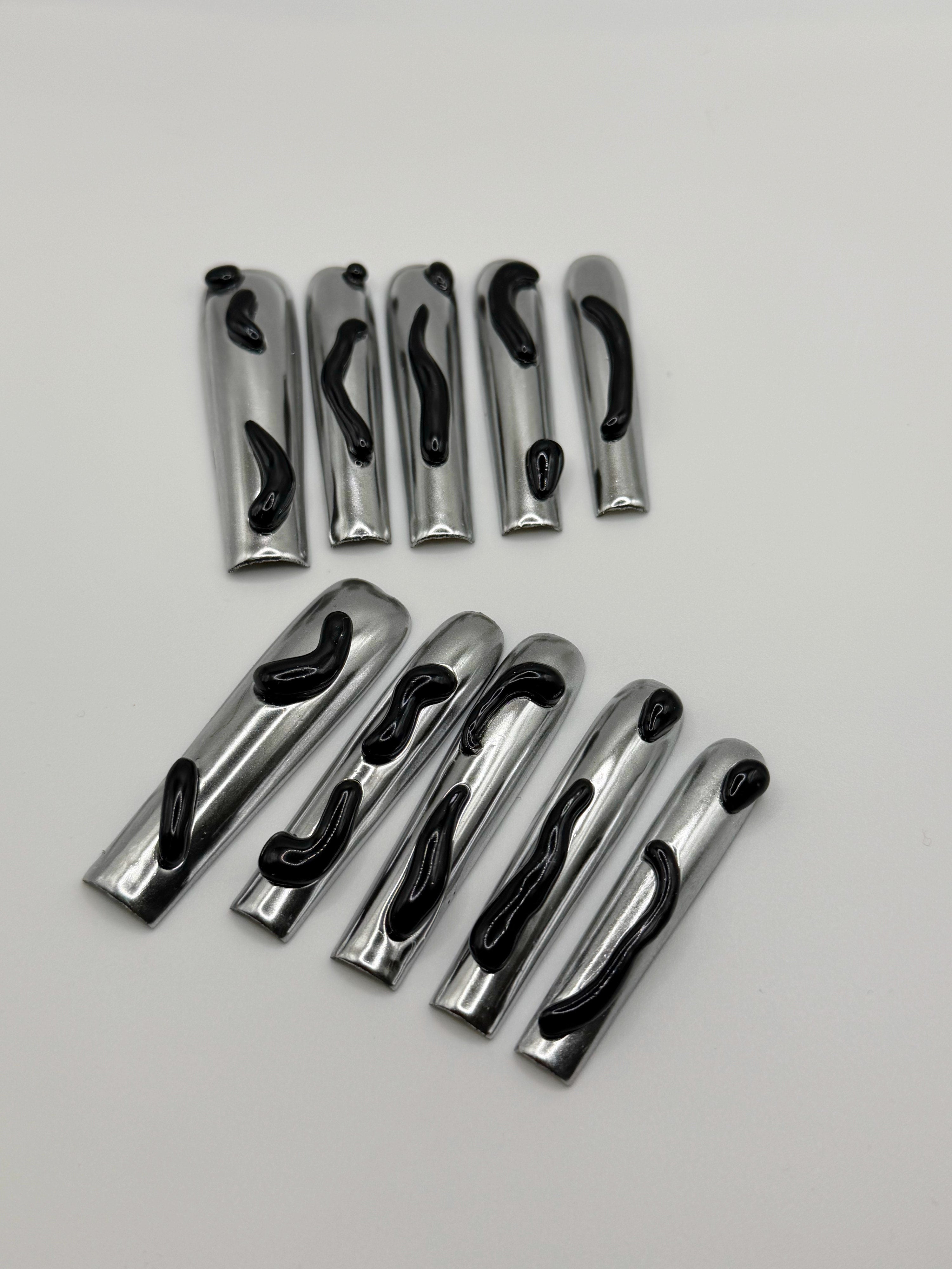 Dark Mirage – Chrome Silver Press-On Nails with Black Fluid Designs